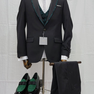 Three-Piece Tuxedo Suit with Contrasting green tapered accent, matching bow tie and Black Pants.