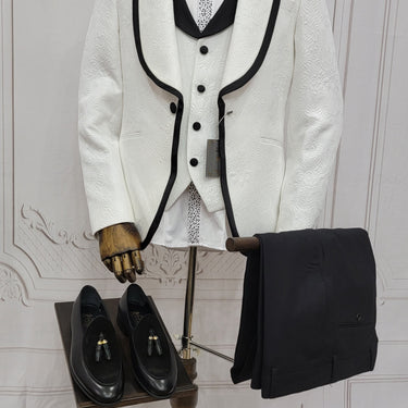 Three Pieces Tuxedo Suit with Contrasting Black tapered Lapel, matching bow tie and Black Pants.