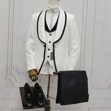 Three Pieces Tuxedo Suit with Contrasting Black tapered Lapel, matching bow tie and Black Pants.