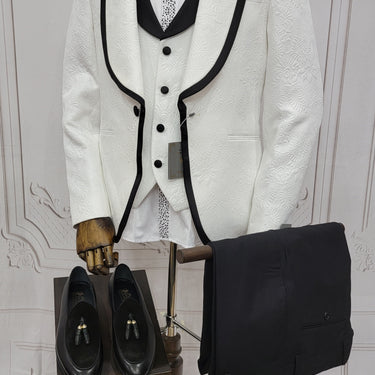 Three Pieces Tuxedo Suit with Contrasting Black tapered Lapel, matching bow tie and Black Pants.