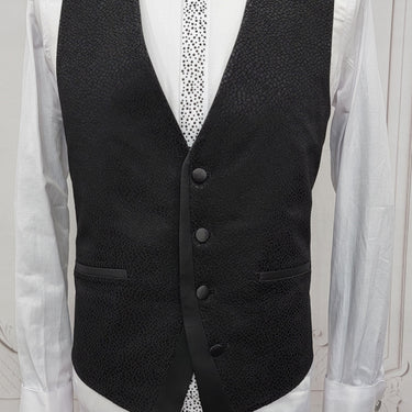 Three Pieces Tuxedo Suit with a Classic Black Satin Lapel, matching bow tie and Black Pants.