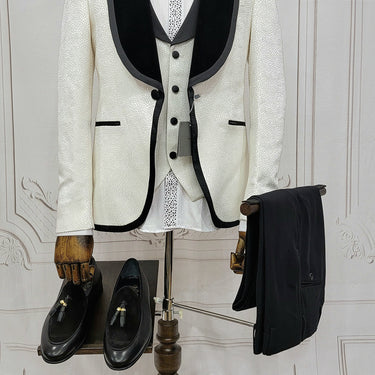 Three Pieces Tuxedo Suit with contrasting black velvet Lapel, matching bow tie and Black Pants.