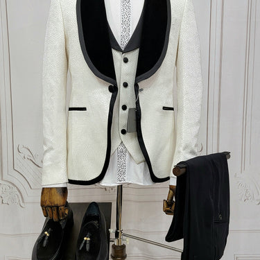 Three Pieces Tuxedo Suit with contrasting black velvet Lapel, matching bow tie and Black Pants.