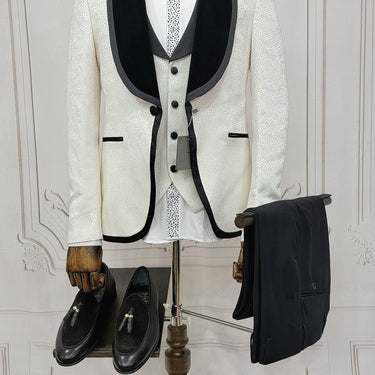 Three Pieces Tuxedo Suit with contrasting black velvet Lapel, matching bow tie and Black Pants.
