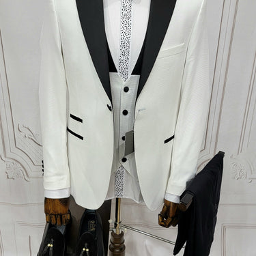 Three Pieces Tuxedo Suit with Contrasting Black Lapel, matching bow tie and Black Pants.