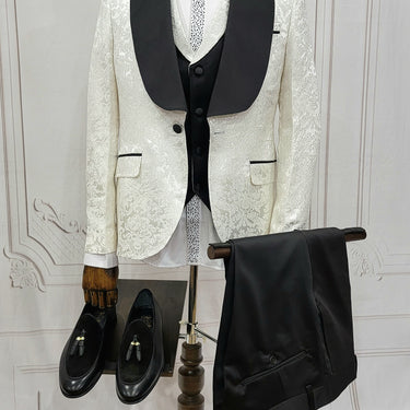 Three Pieces Tuxedo Suit with Contrasting Black Satin Lapel, matching bow tie and Black Pants.