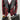 Three Pieces Tuxedo Suit with Black Satin Lapel, Contrasting black vest and black dress pants.