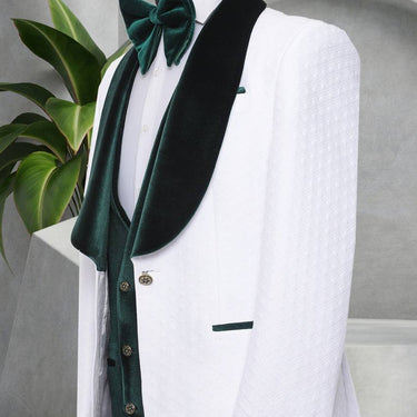 Three Pieces Tuxedo Suit with contrasting green velvet Lapel, matching bow tie and Black Pants.