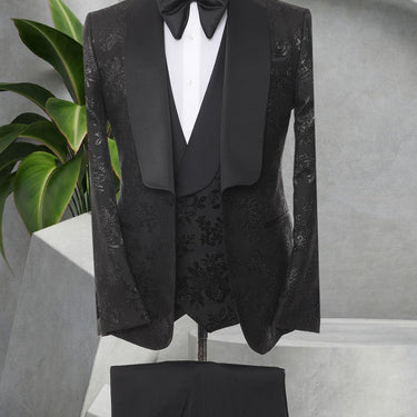Three Pieces Tuxedo Suit with a Satin Lapel, matching bow tie and Black Pants.