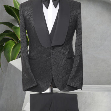 Three Pieces Tuxedo Suit with a Satin Lapel, matching bow tie and Black Pants.